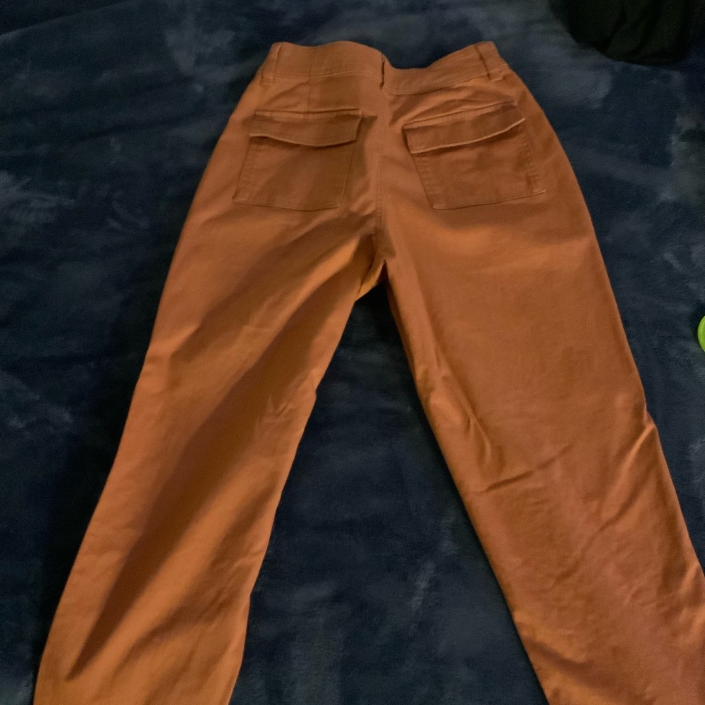 Newly used dark orange joggers, great material and comfy as well as casual